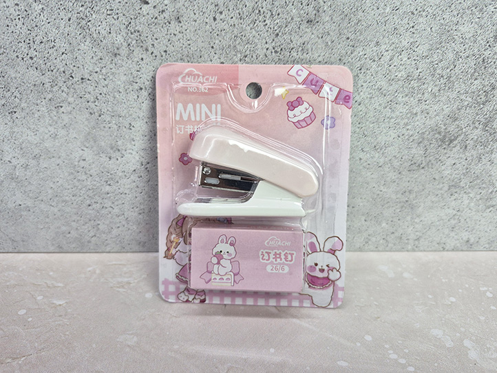 Mini abrochadora con ganchitos